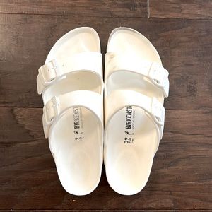 White Birkenstock rubber sandals